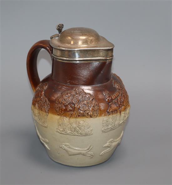 A silver mounted Mortlake stoneware jug height 21cm